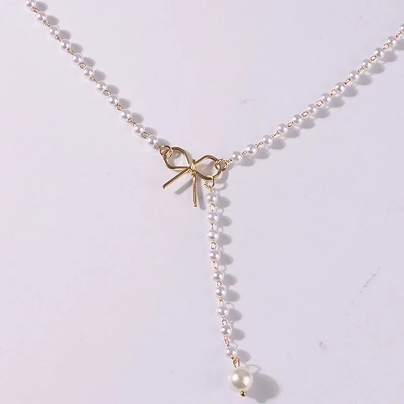 Collier Choker Perles d'Imitation & Pompons – Tendance & Féminin